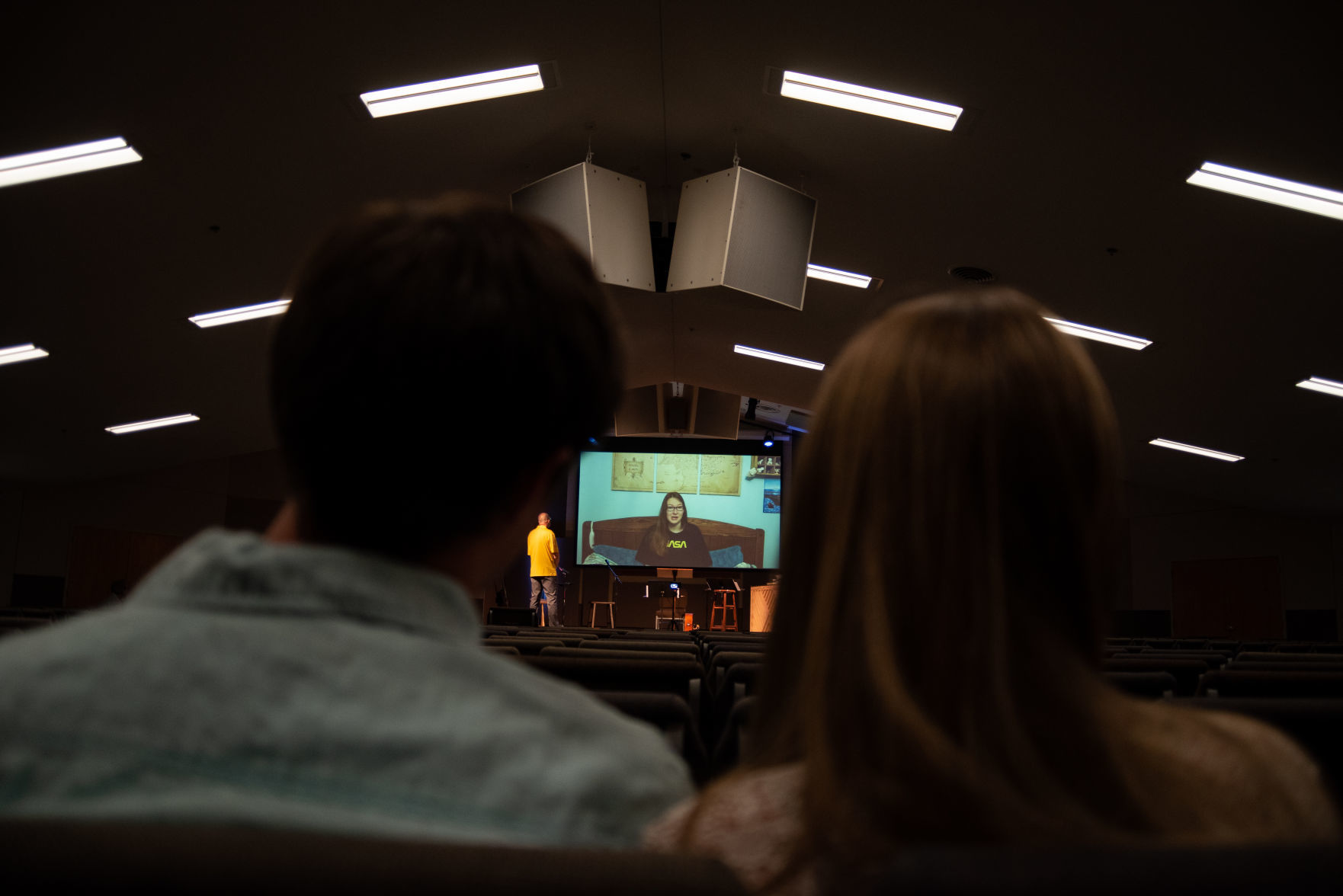Cody Toll and Kristen Toll listen to pre-recorded messages from high school students at Faith Evangelical Free Church during the recording of the service that will stream on Sunday.